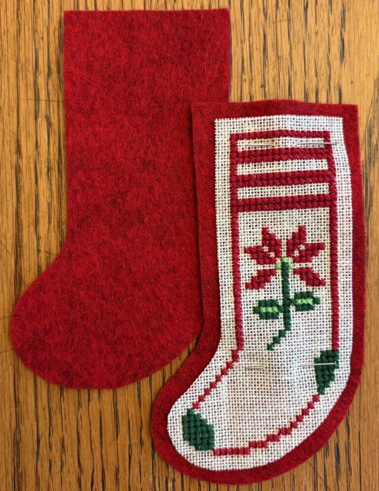 Stocking pinned to one felt backing, overlaying the other felt backing